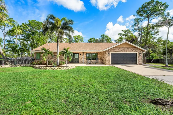 001-18429SycamoreDriveWest-TheAcreage-FL