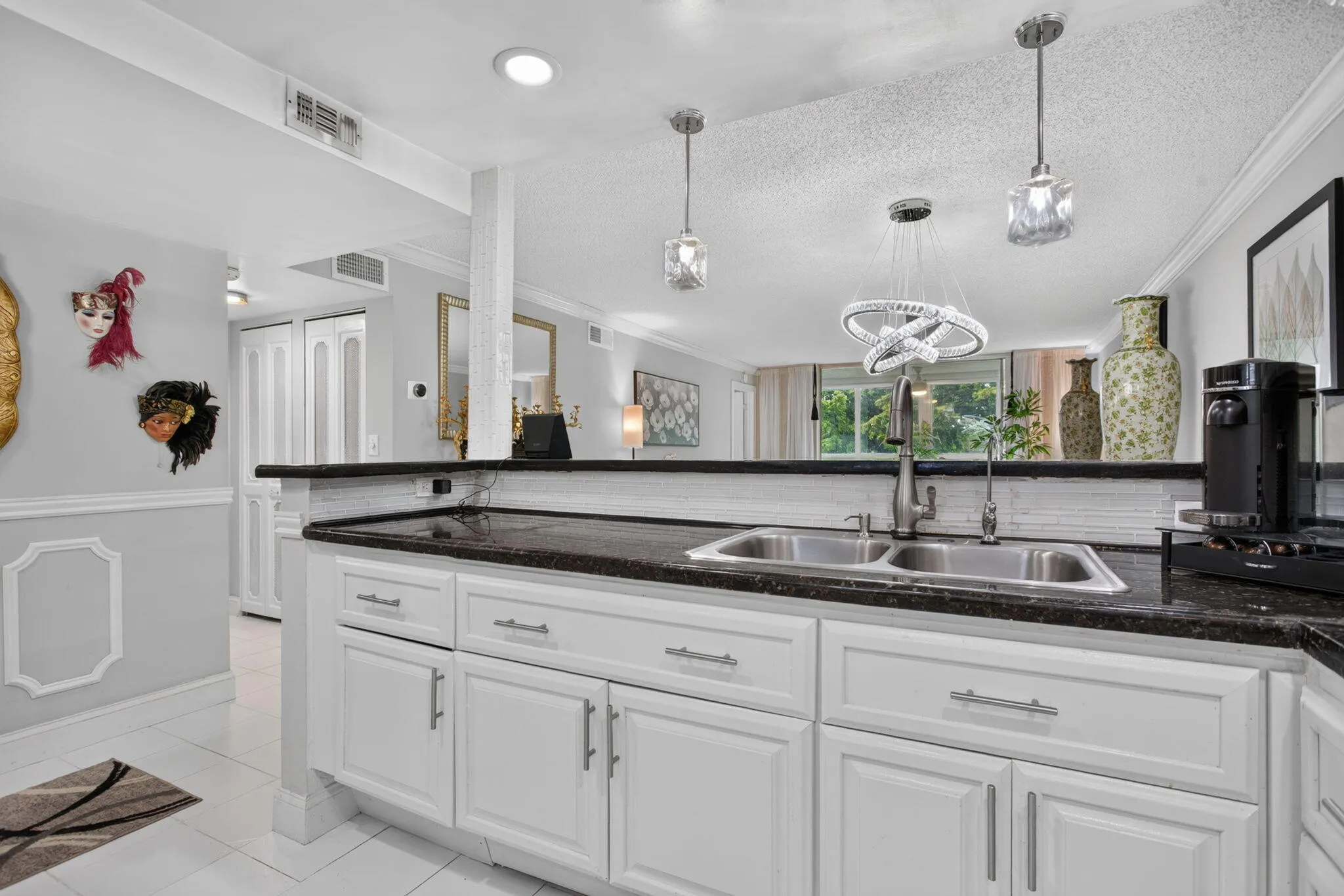 CUSTOM, OPEN CONCEPT KITCHEN WITH LARGE SNACK BAR FOR ENTERTAINING