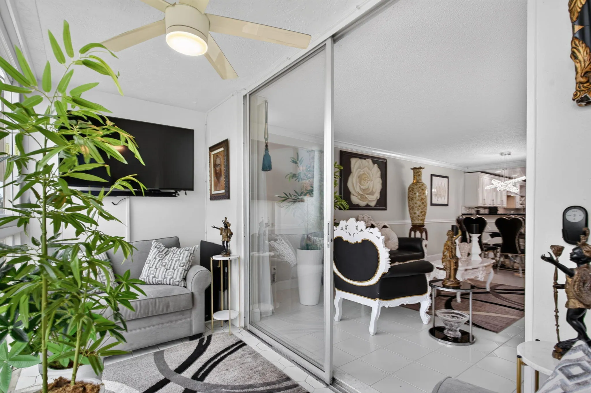 VIEW OF LIVING ROOM FROM YOUR ENCLOSED BALCONY