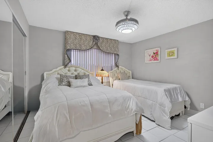 GUEST BEDROOM WITH ELEGANT HIDDEN CEILING FAN