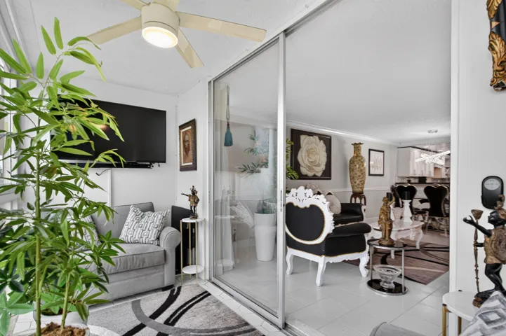 VIEW OF LIVING ROOM FROM YOUR ENCLOSED BALCONY