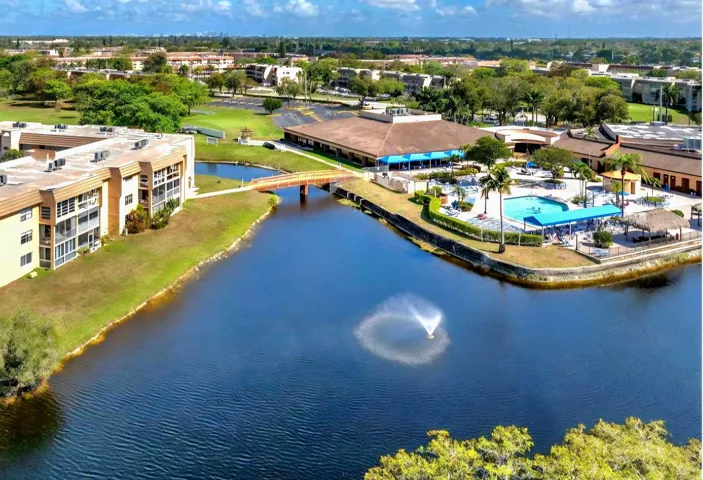 VIEW OF YOUR BUILDING WITH CONNECTING BRIDGE TO YOUR CLUBHOUSE!!