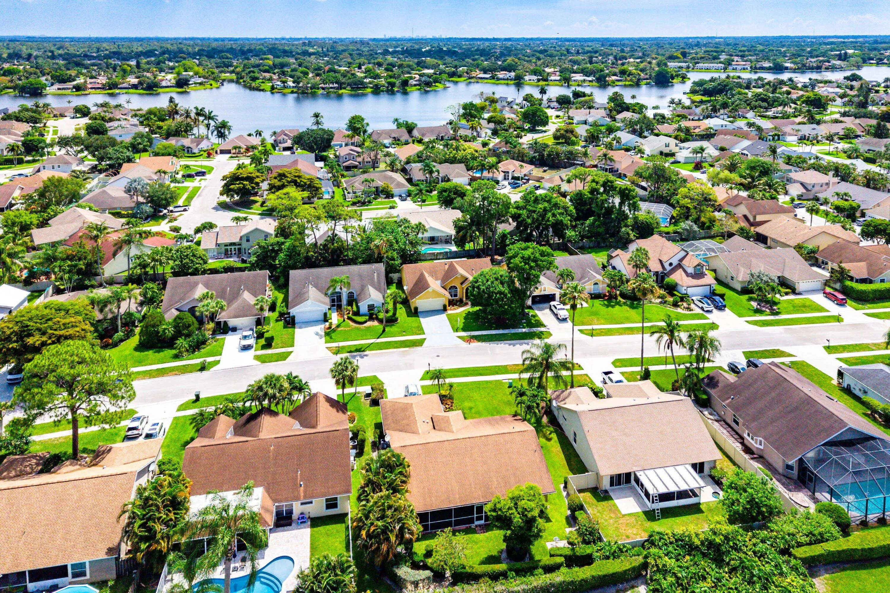 Lakefront neighborhood with mature landscaping and established residences