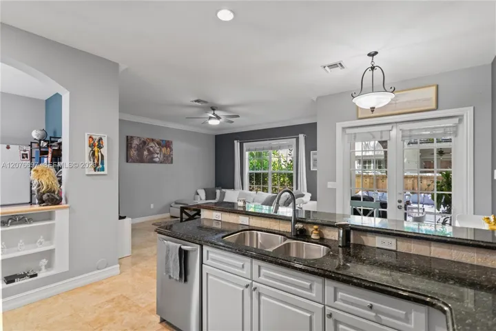 Open Kitchen to Great room with breakfast bar and dining area.