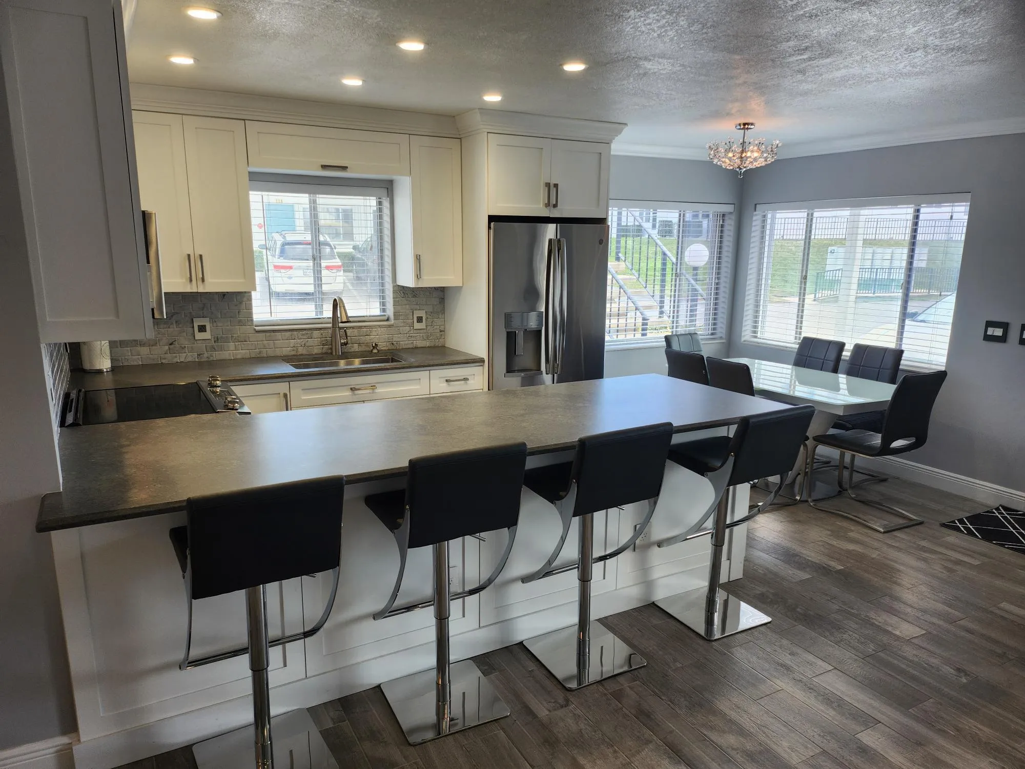 111-view of bar-kitchen-dining area