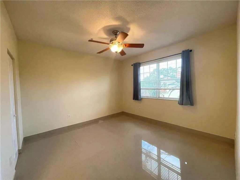 Recessed window featuring horizontal blinds