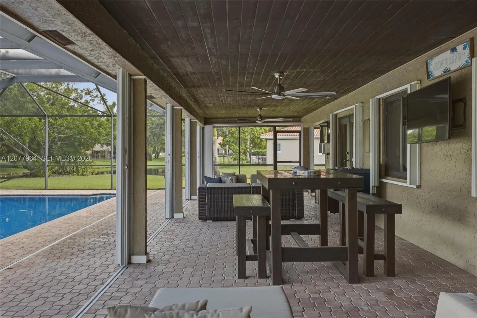 COVERED PATIO W/ HURRICANE PROTECTION