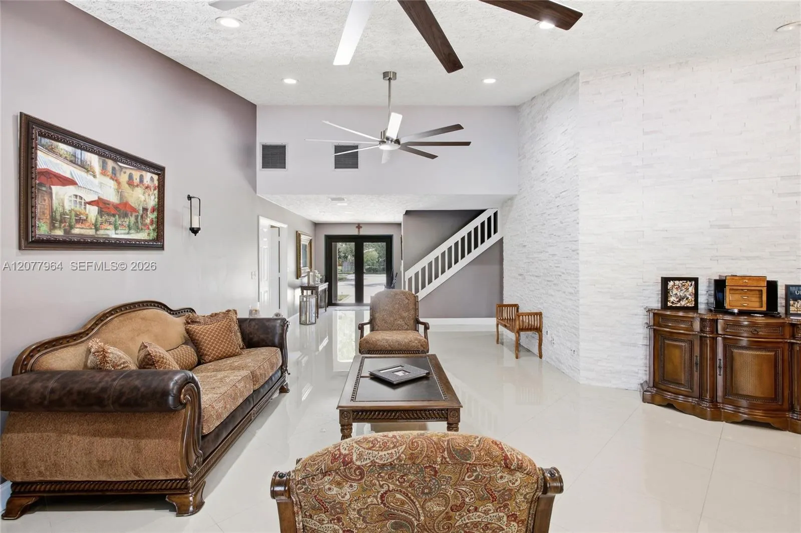 LIVING ROOM VIEW FACING FRONT DOOR ENTRY