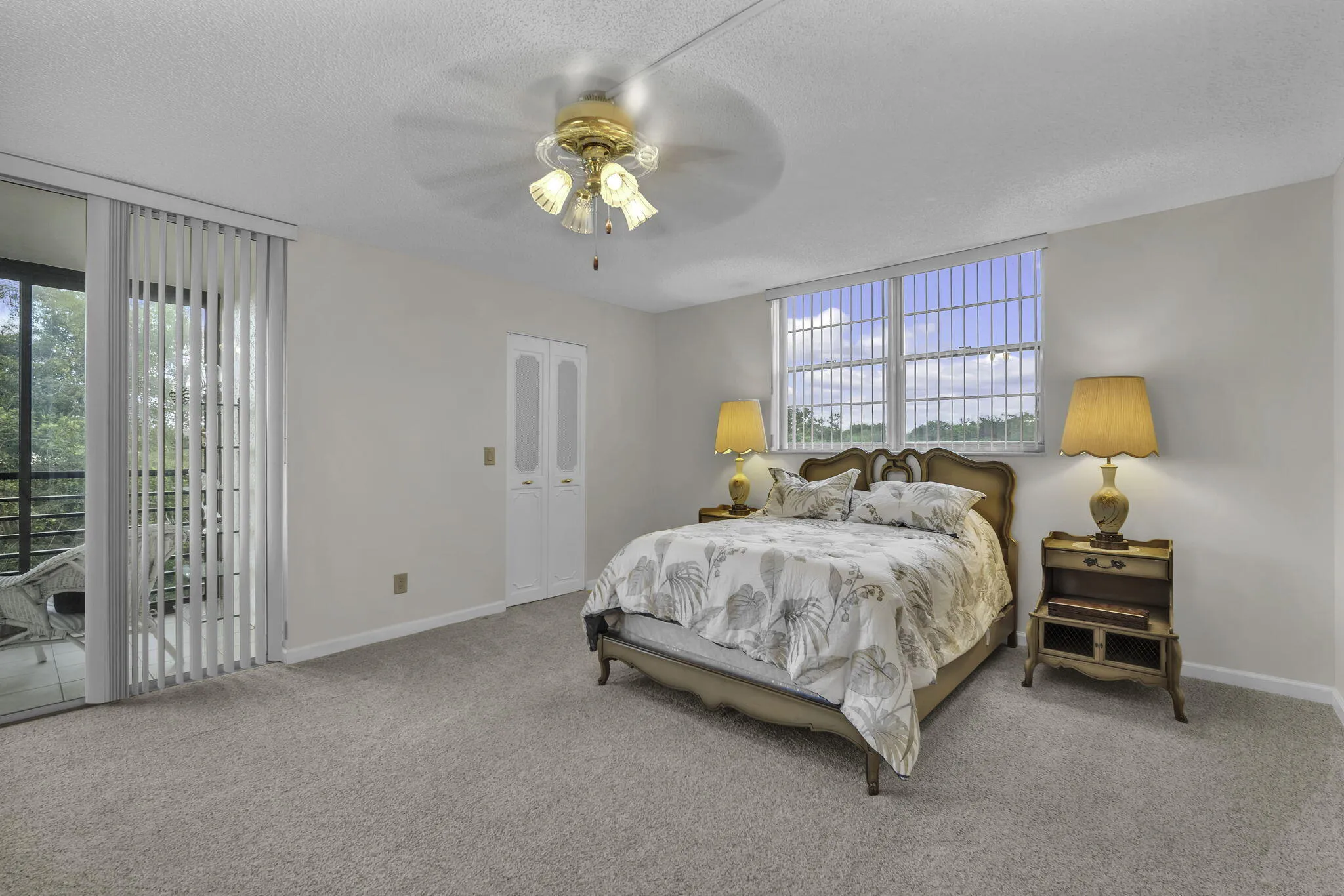 2 closets, natural light, and sliders to patio