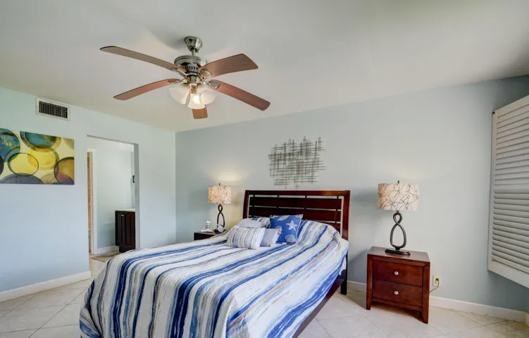 Neutral-toned walls complement the tile flooring