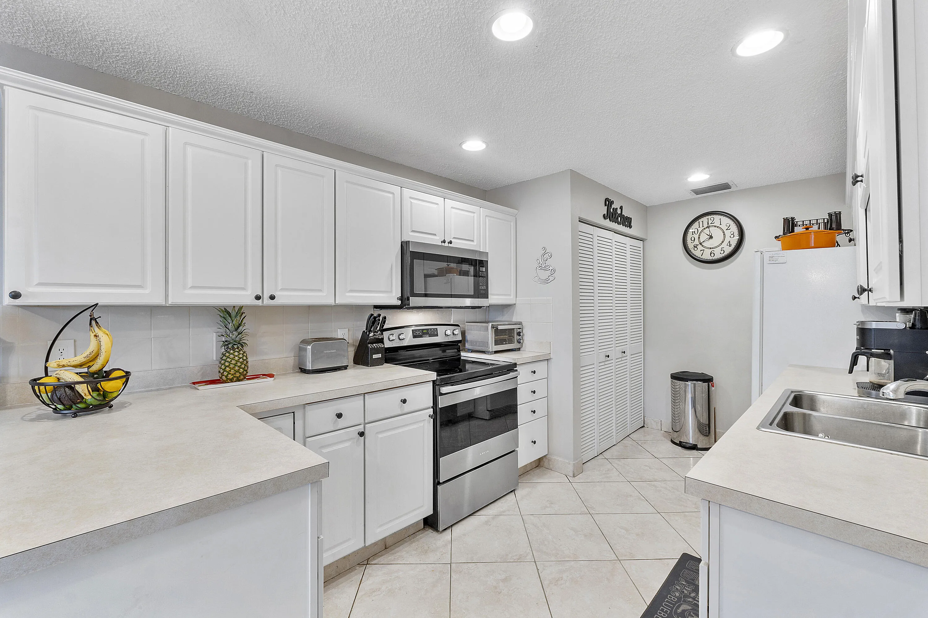 Kitchen with Washer & Dryer, newer stove, microwave