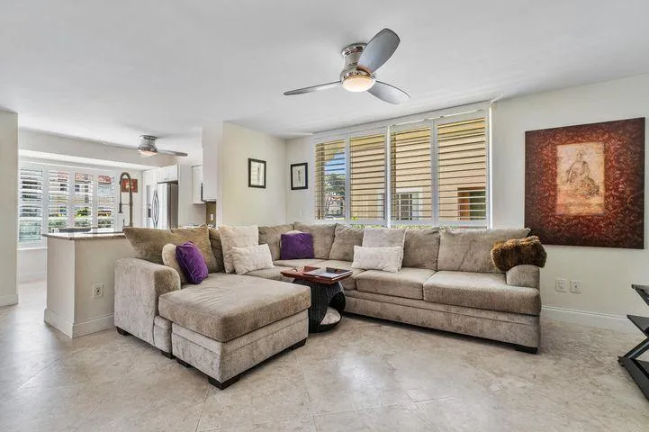 123 living area with kitchenn behind