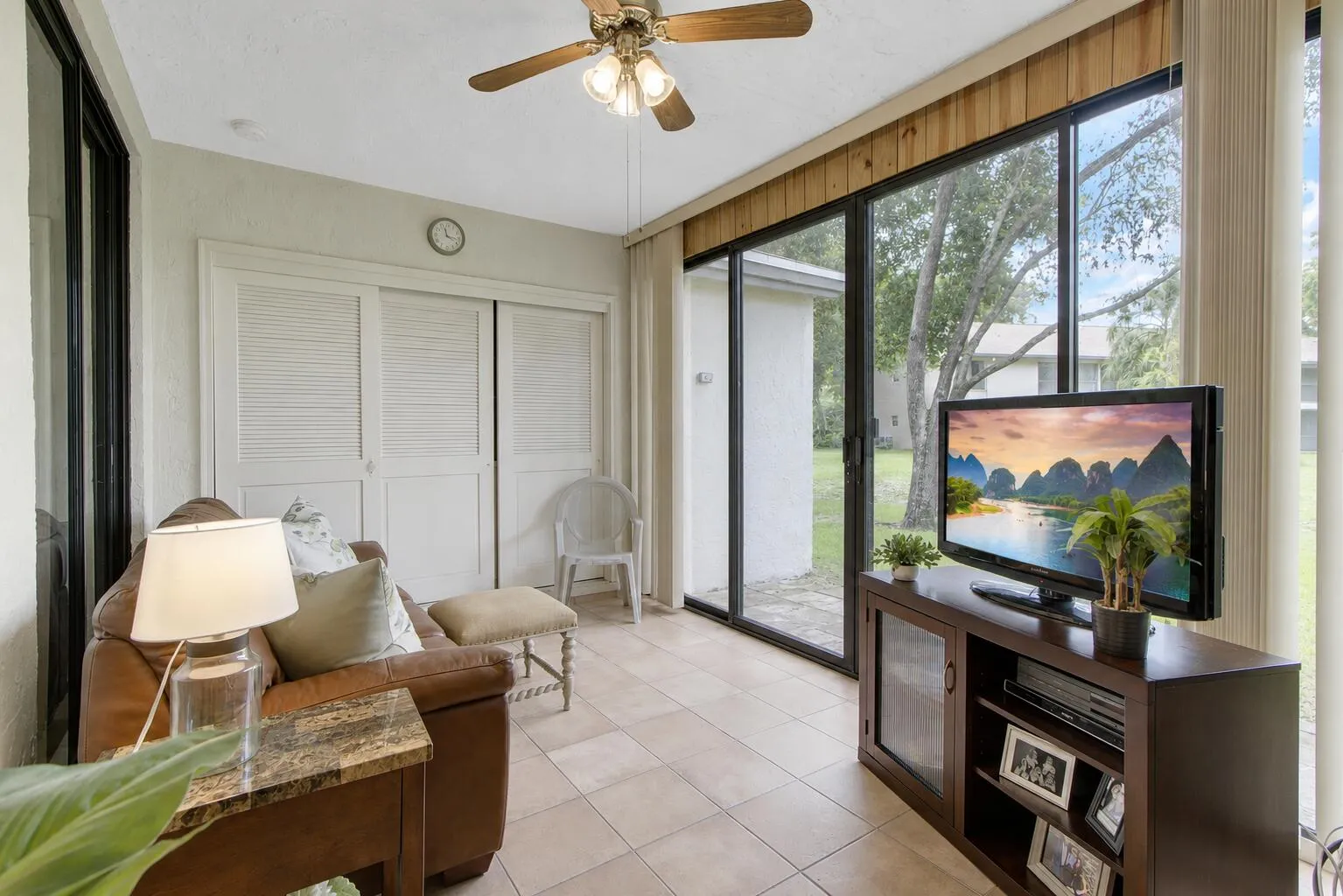 Fabulous Glass Enclosed Porch with beautiful pond views
