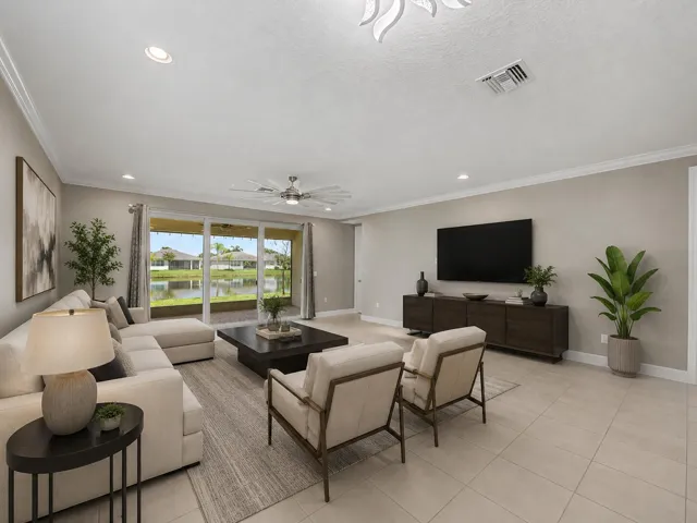 Tile flooring, recessed lighting, crown molding, sliding glass doors, and a ceiling fan