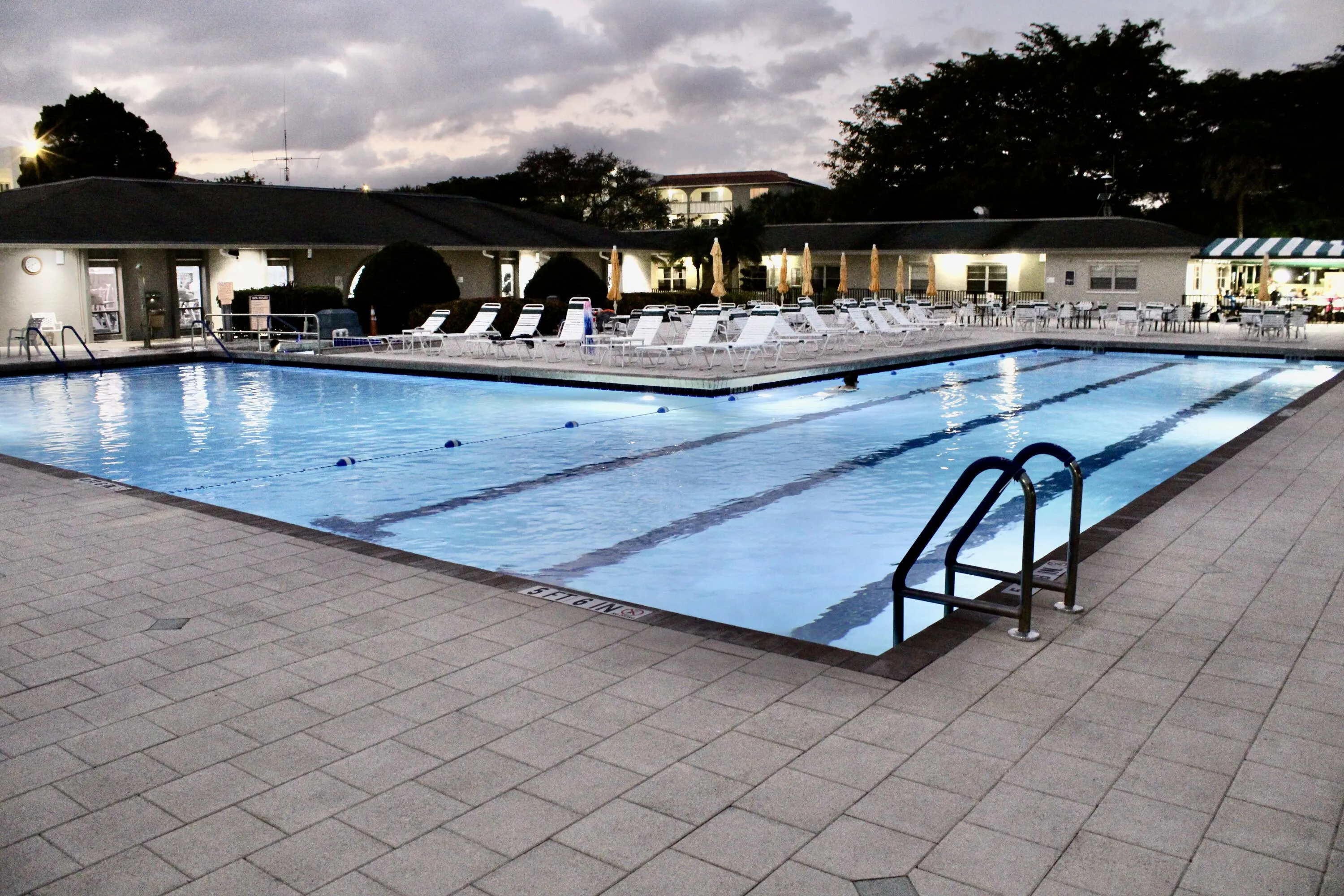 84 WYNMOOR MAIN POOL LIT EVENING VIEW!