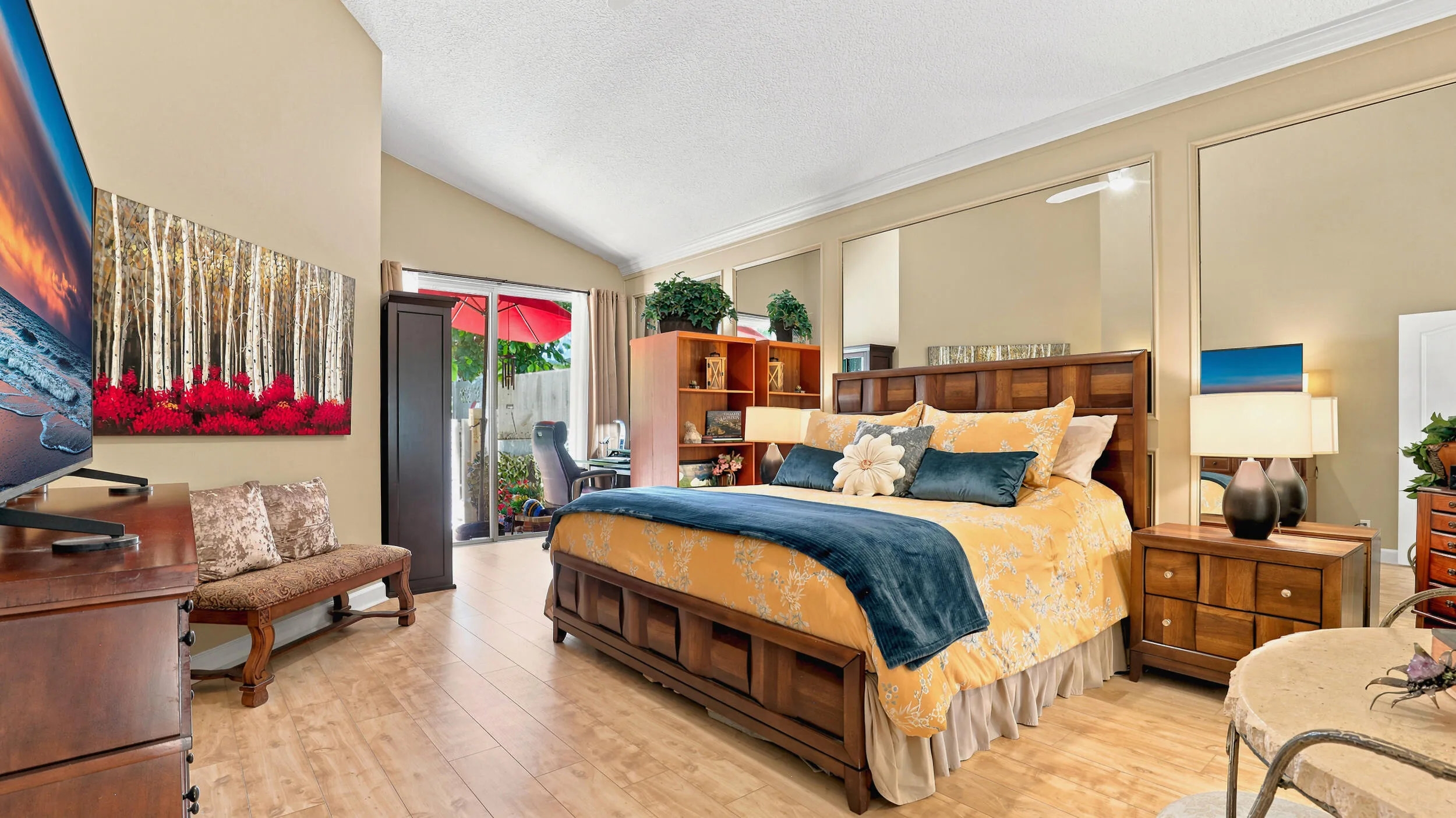 Additional view showcasing the generous primary bedroom and comfortable sitting area.