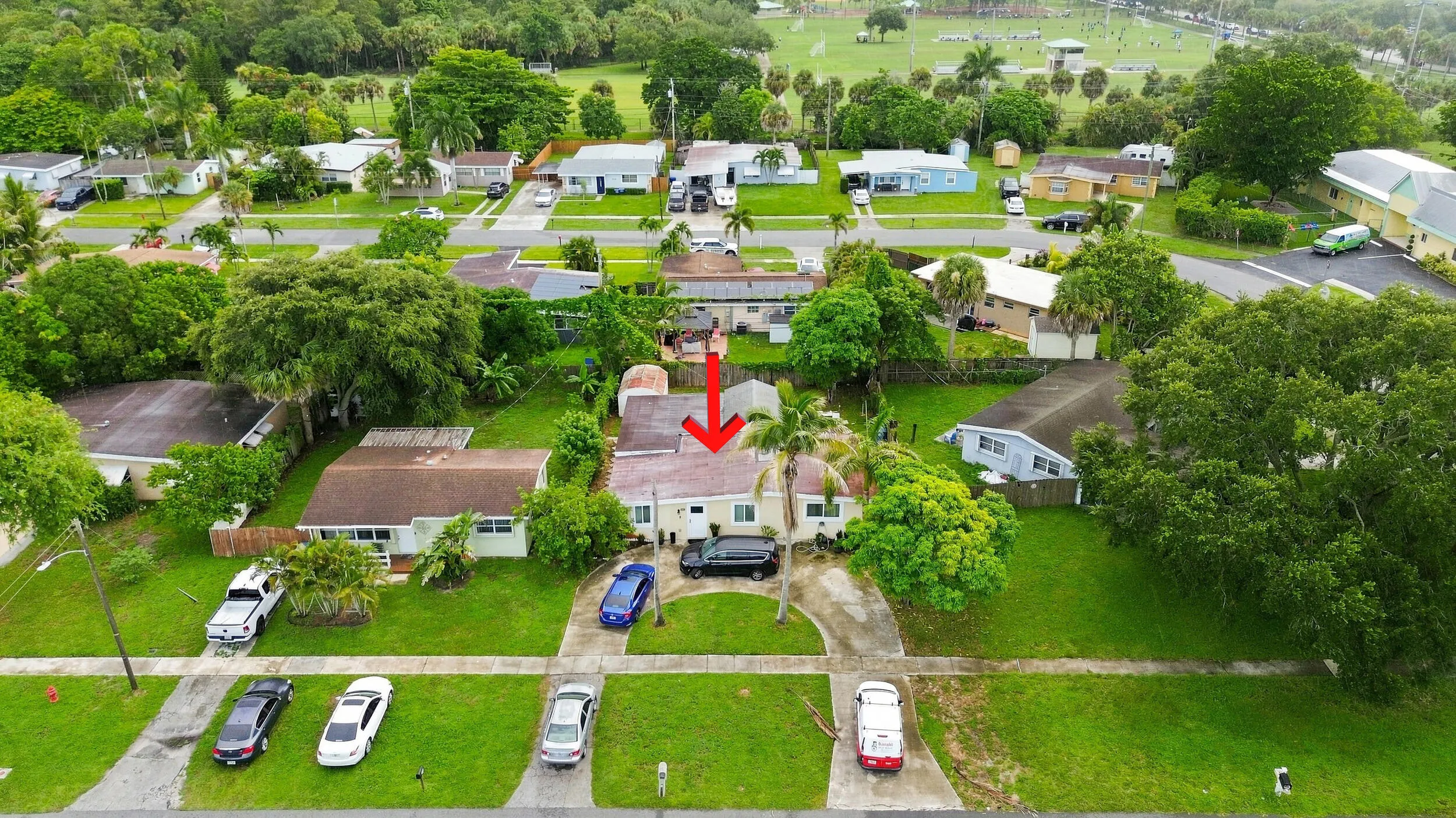 Aerial perspective highlighting the property and its location within the surrounding neighborhood.