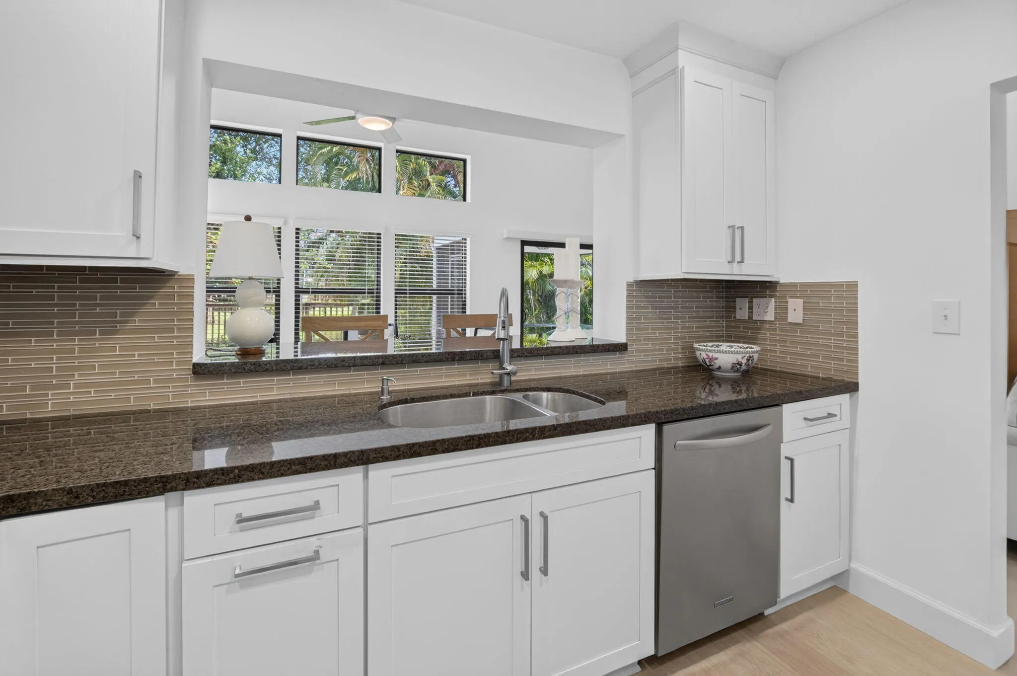 SUNNY KITCHEN WITH WINDOW TO COURTYARD