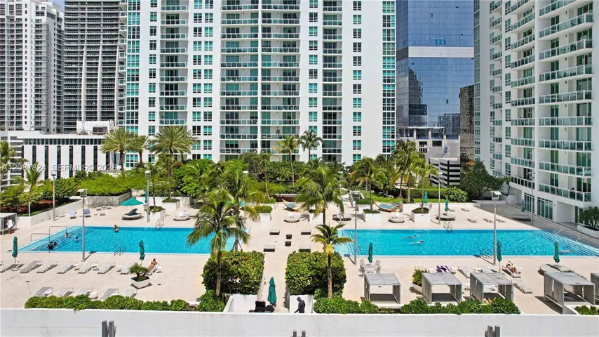 Two Resort Style Pools with Jacuzzi and BBQ area