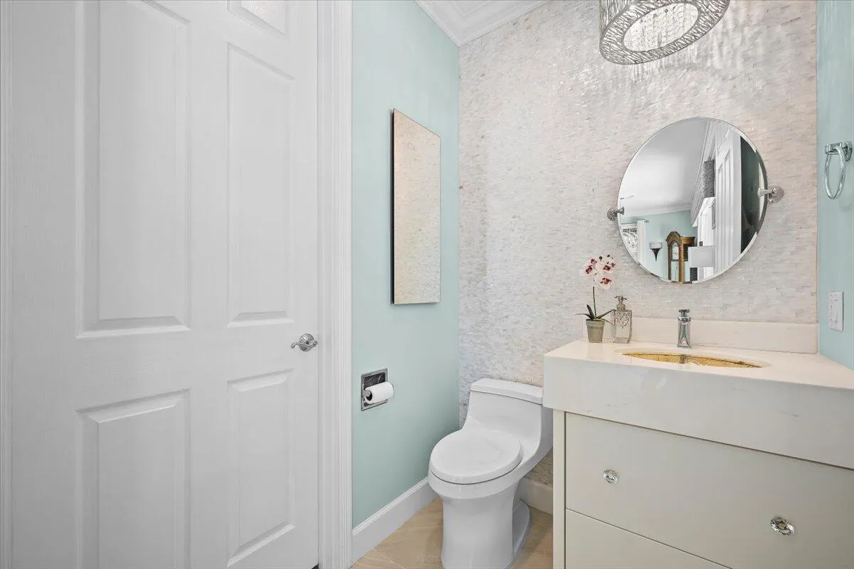 Gorgeous Tile wall, built in Medicine cabinet, lit sink, custom vanity