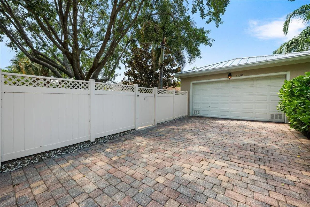 Extra Long Driveway overlooking a greenspace in rear of home
