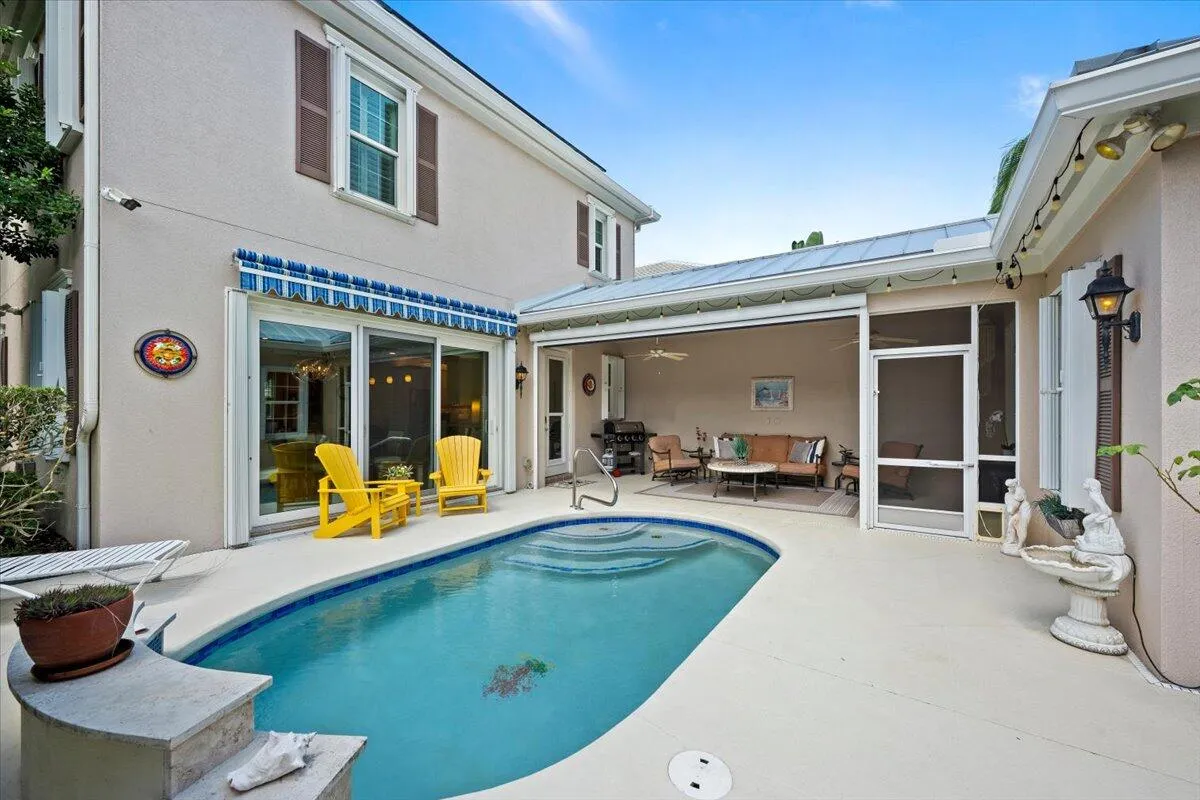 Auto awning over sliders creates additional shade and character