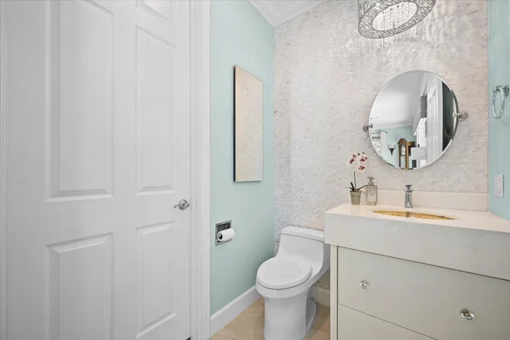 Gorgeous Tile wall, built in Medicine cabinet, lit sink, custom vanity