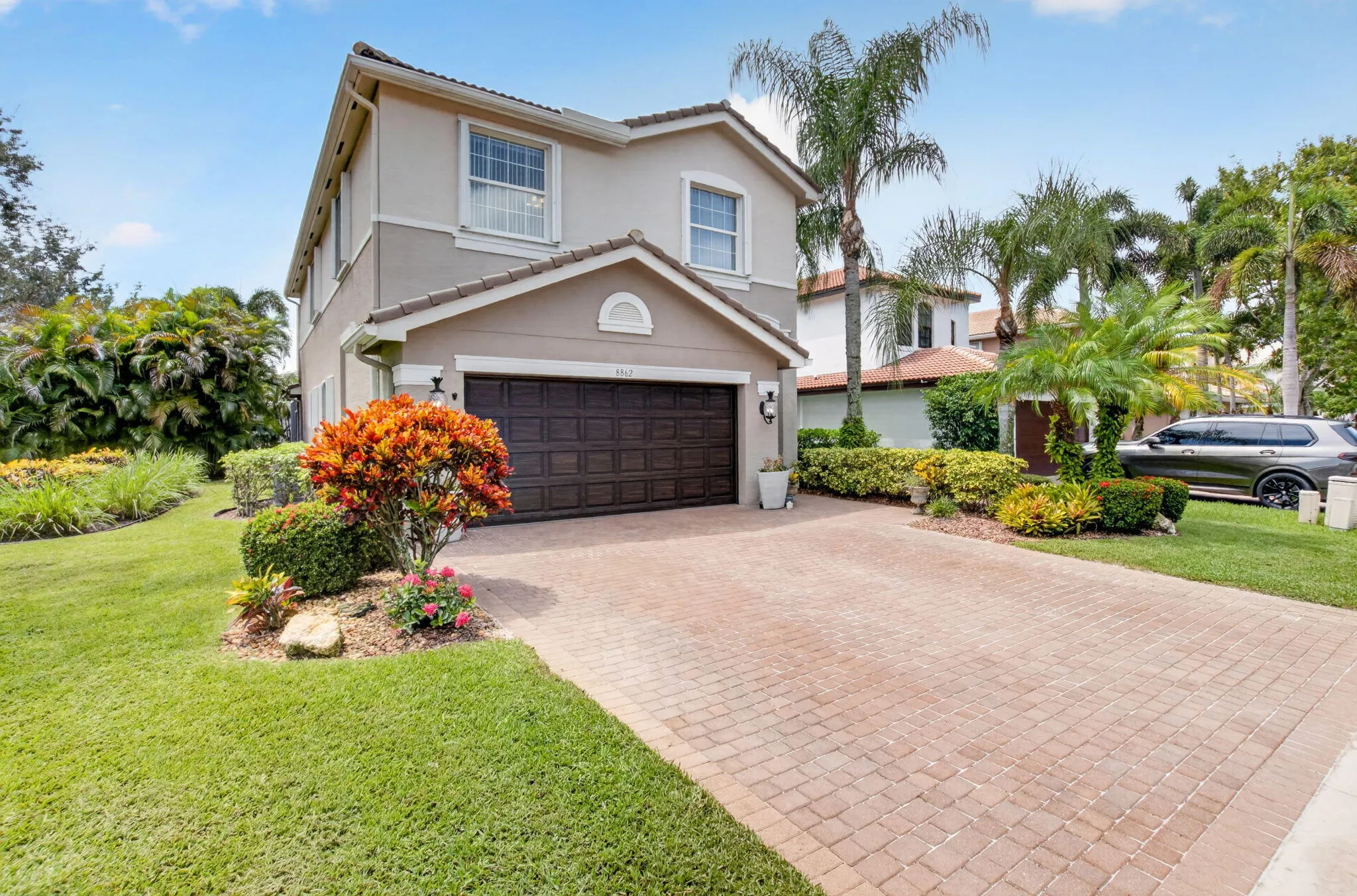 Corner Lot Frontage & Mature Tropical Beds