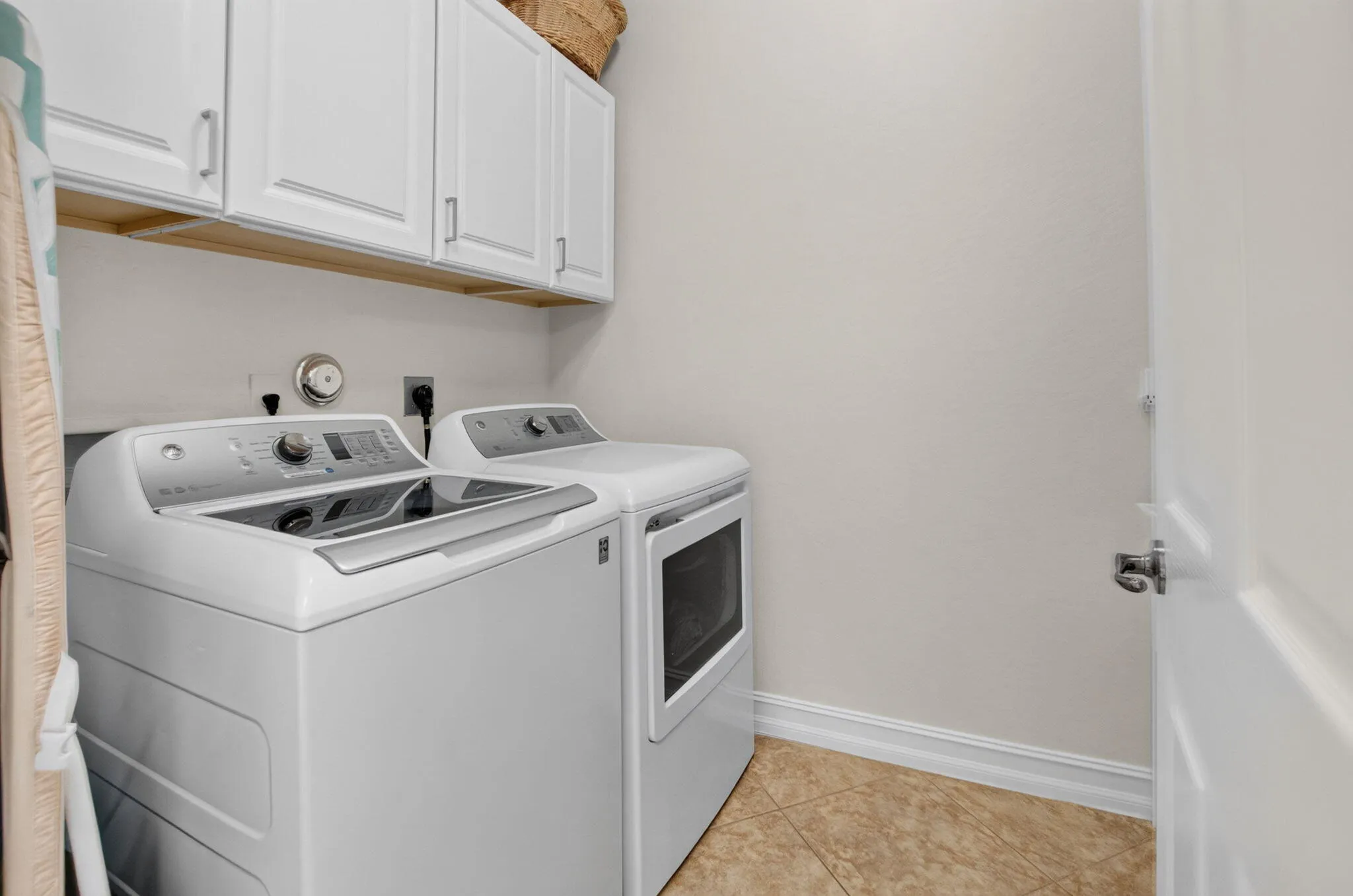 Interior Laundry Room with Storage Cabinets