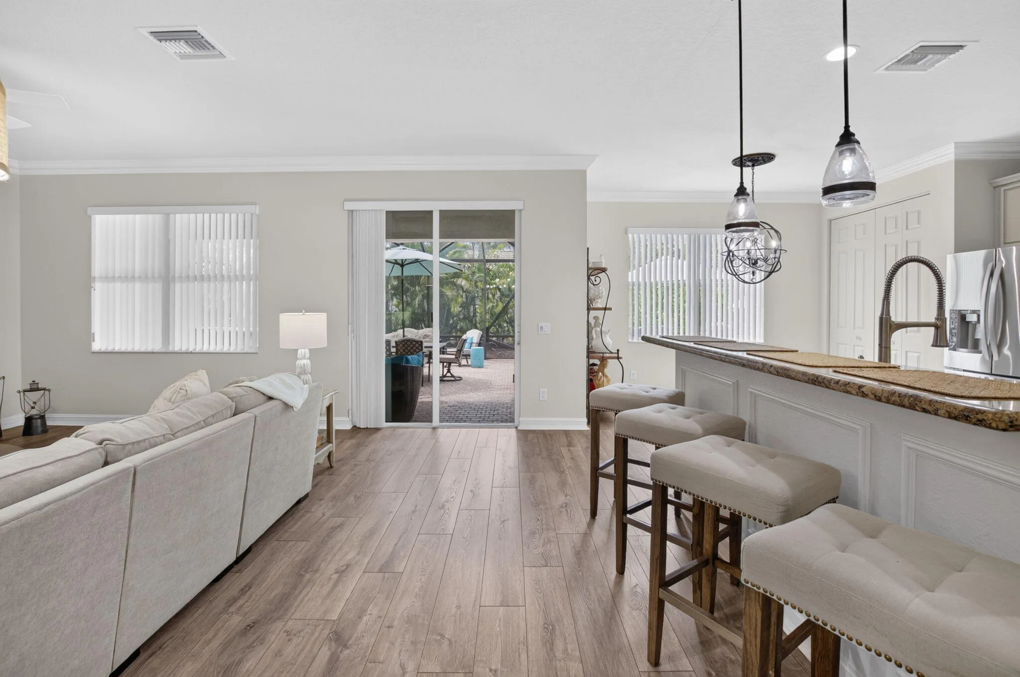 Family Room Opens to Kitchen & Screened Patio