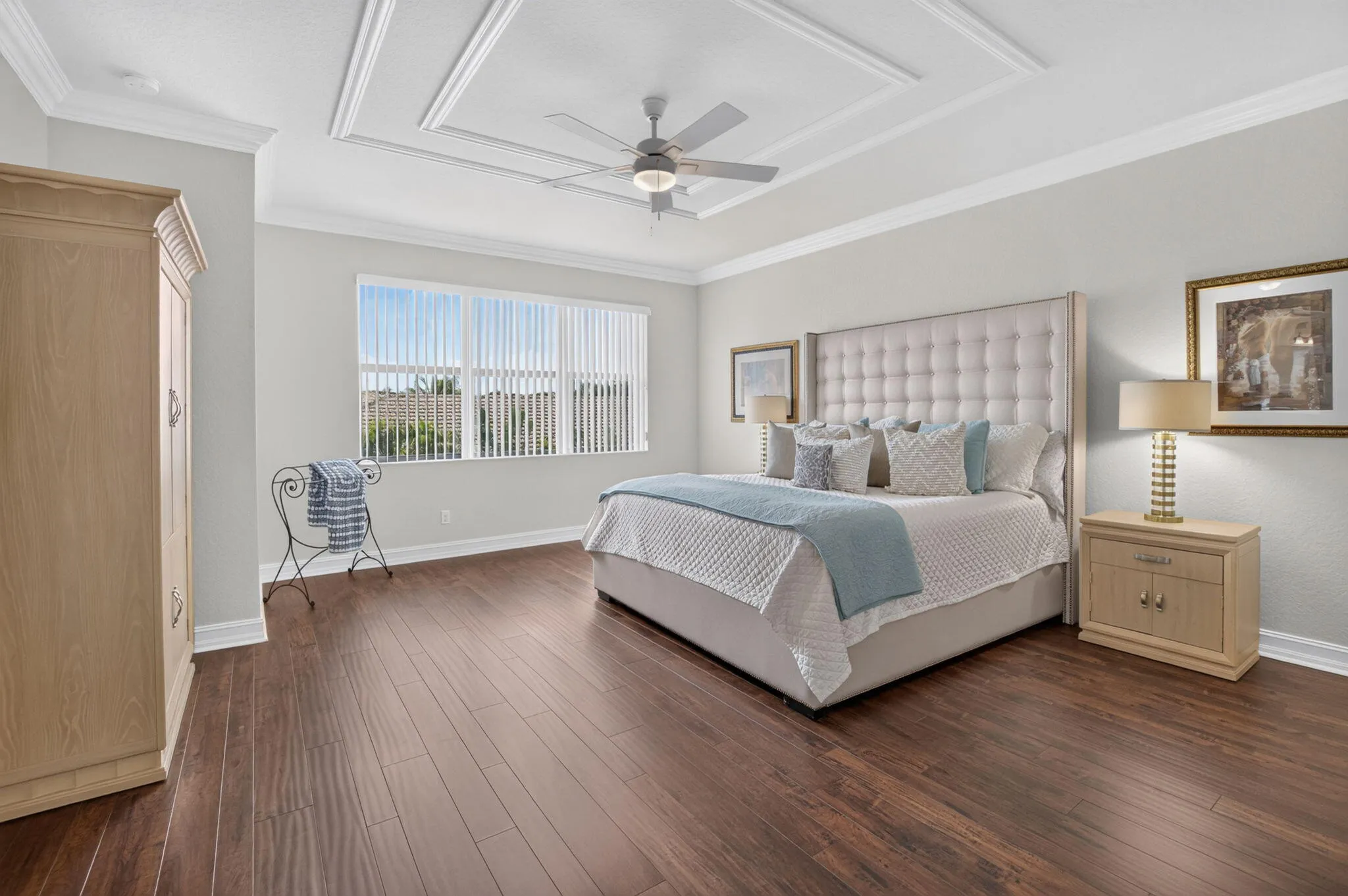 Primary Suite | Tray Ceiling & Wood Floors