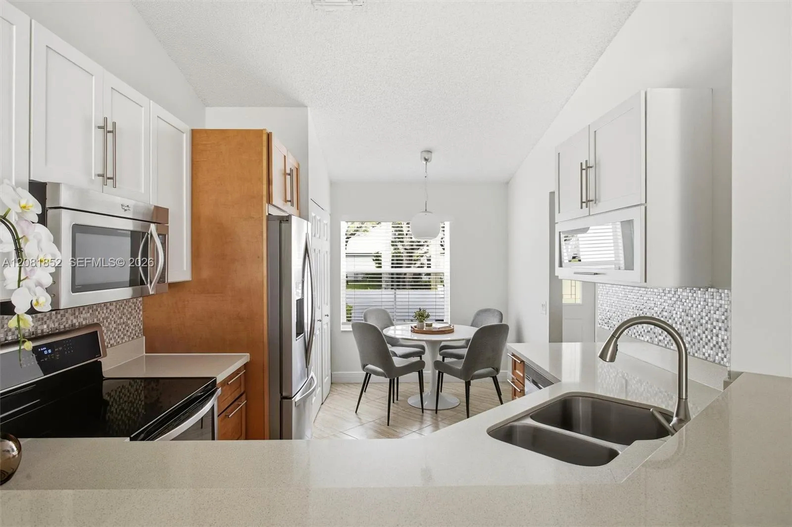 Open kitchen overlooking the living area, ideal for entertaining.