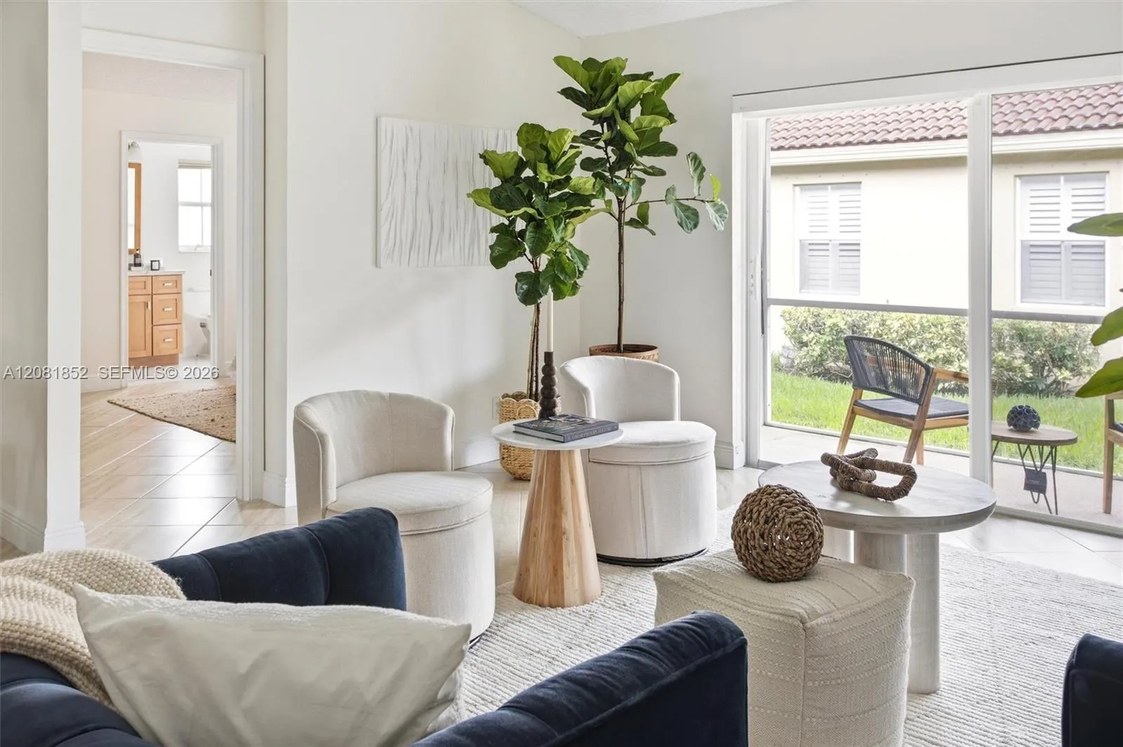 Open living space perfect for entertaining, with serene outdoor views.