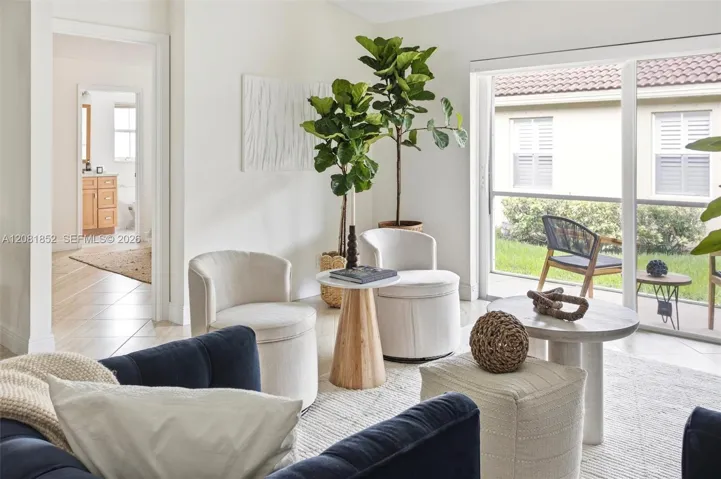 Open living space perfect for entertaining, with serene outdoor views.