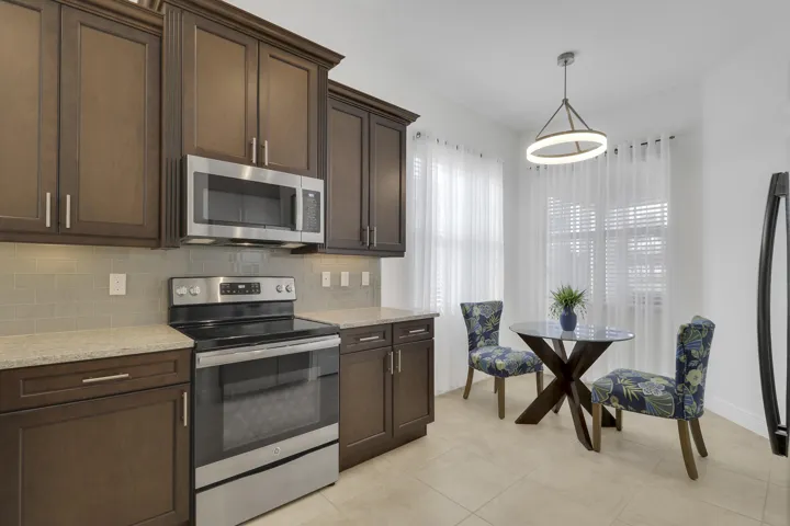 upgraded cabinets and stainless appliances.