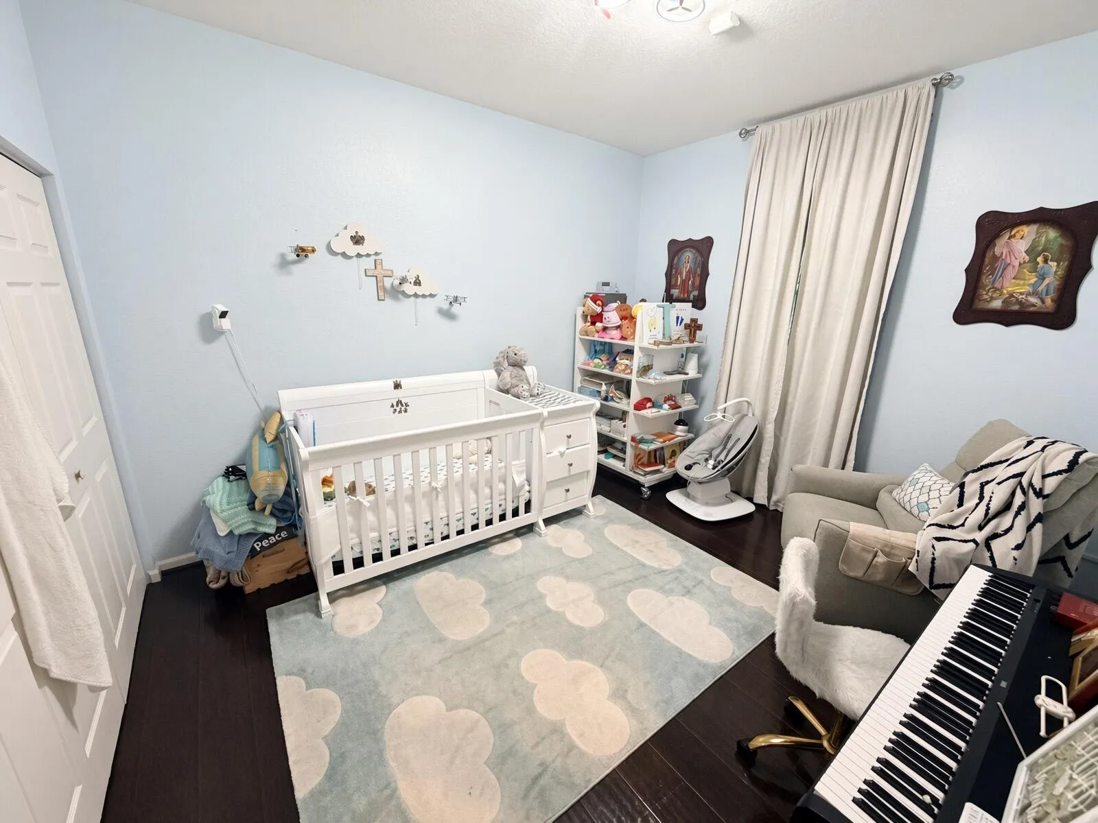 Dark flooring with light blue wall paint