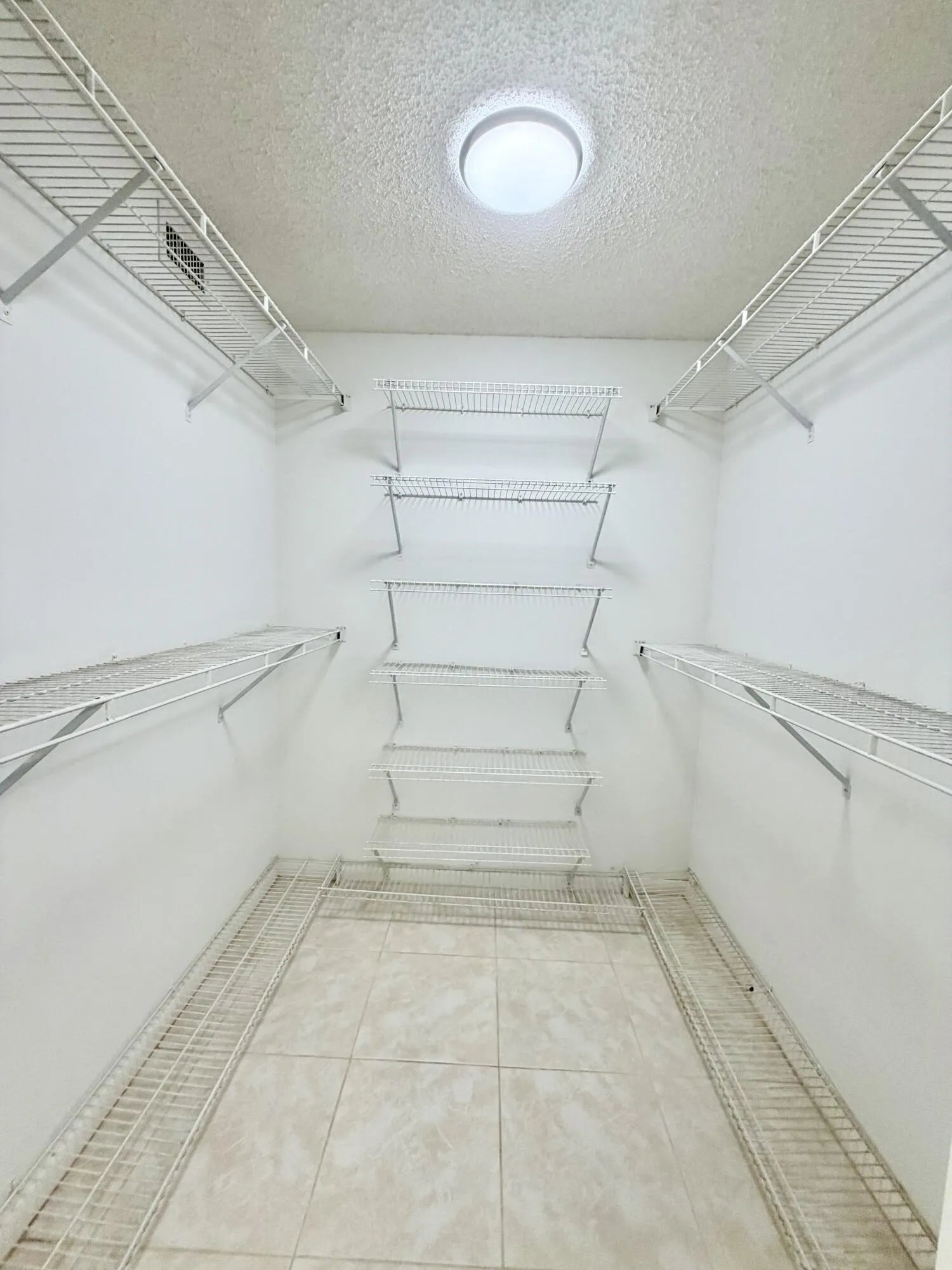 Large Primary Walk In Closet