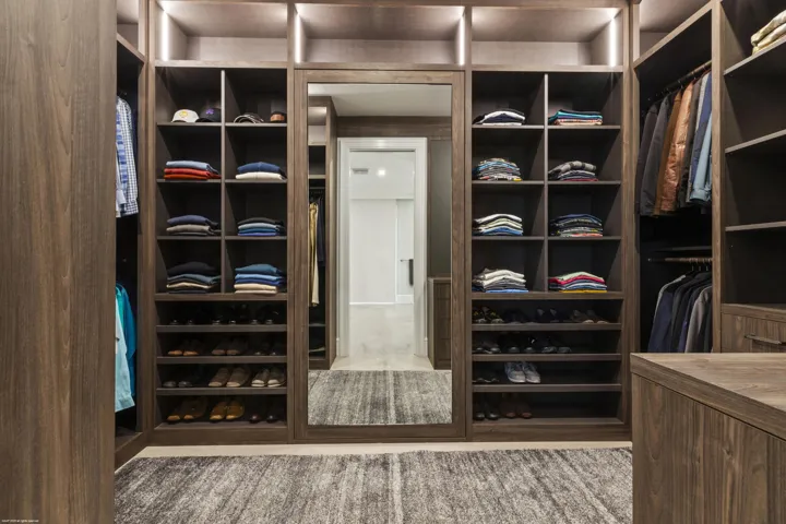 Primary Suite Walk in Closet #2 with hidden door