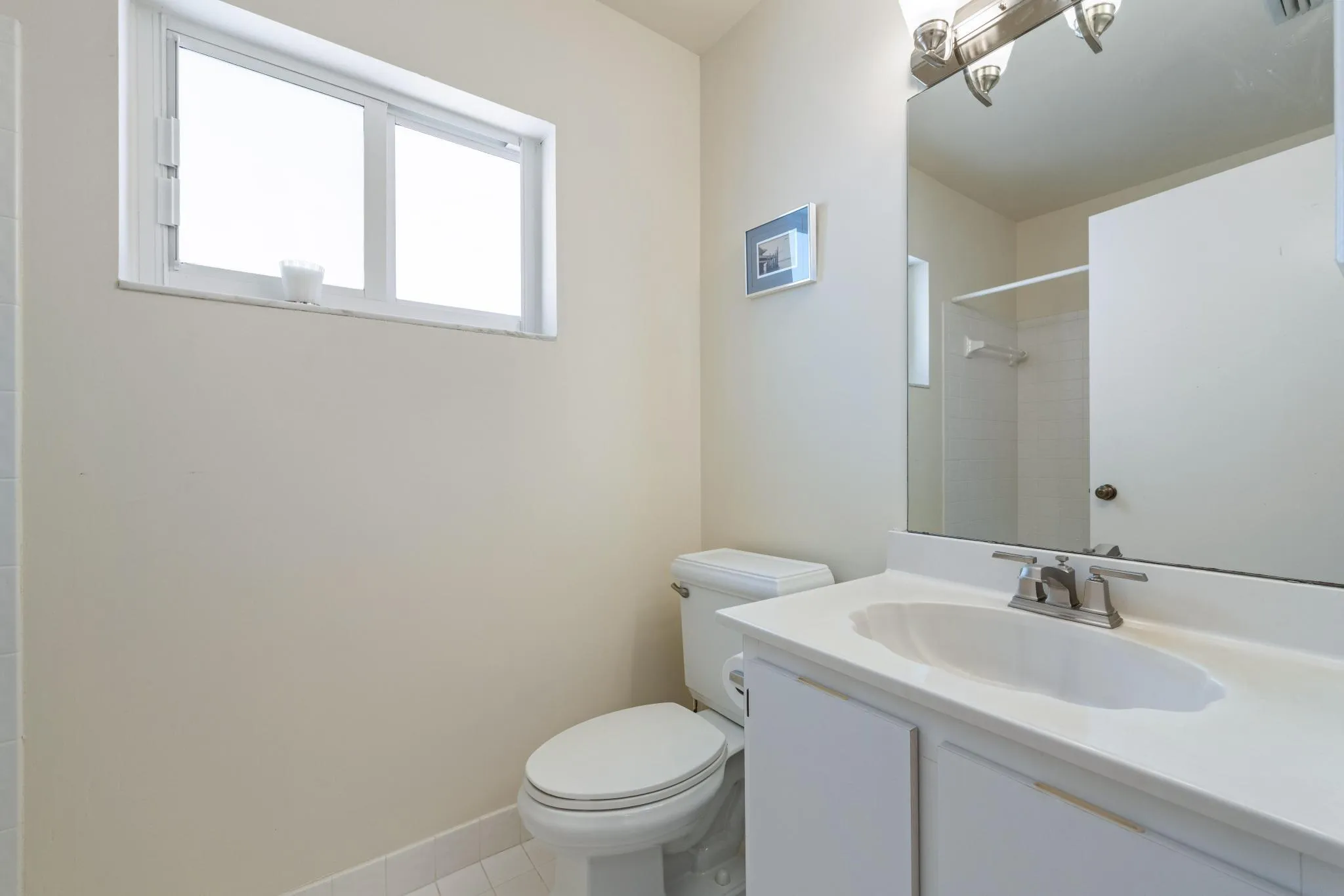 bathroom toilet near laundry
