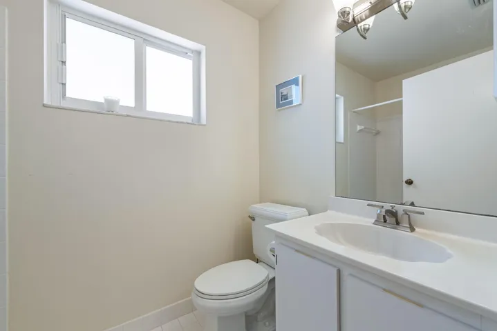 bathroom toilet near laundry