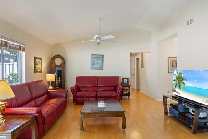 9822 red couch and wall and tv