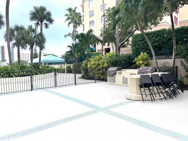 Enjoy this community BBQ close to water's edge and pool area.