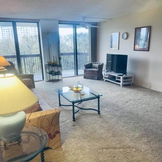 Living and dining room with an Intracoastal view of the water.