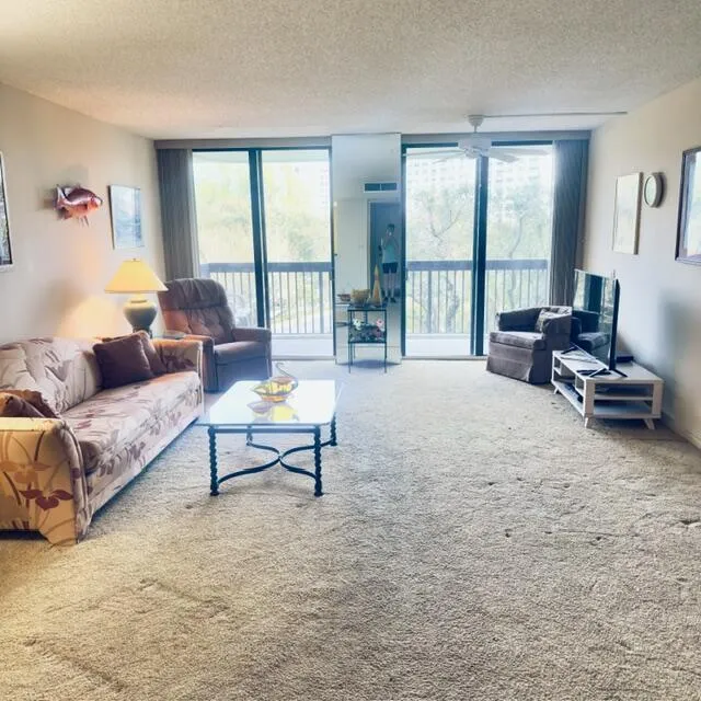 Living and dining room with impact sliders.