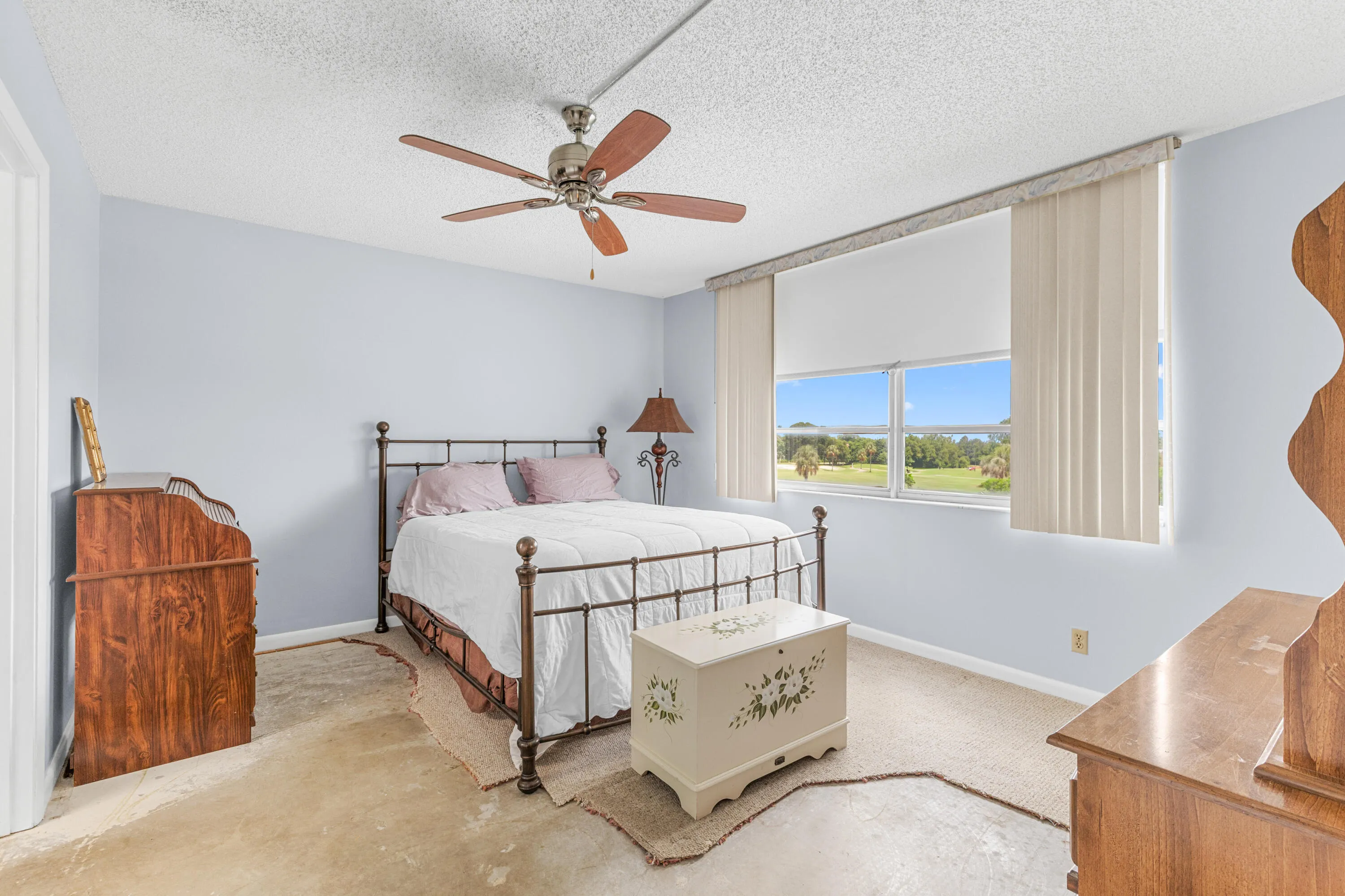 MASTER BEDROOM OVERLOOKS A WATERVIEW AND A POOL