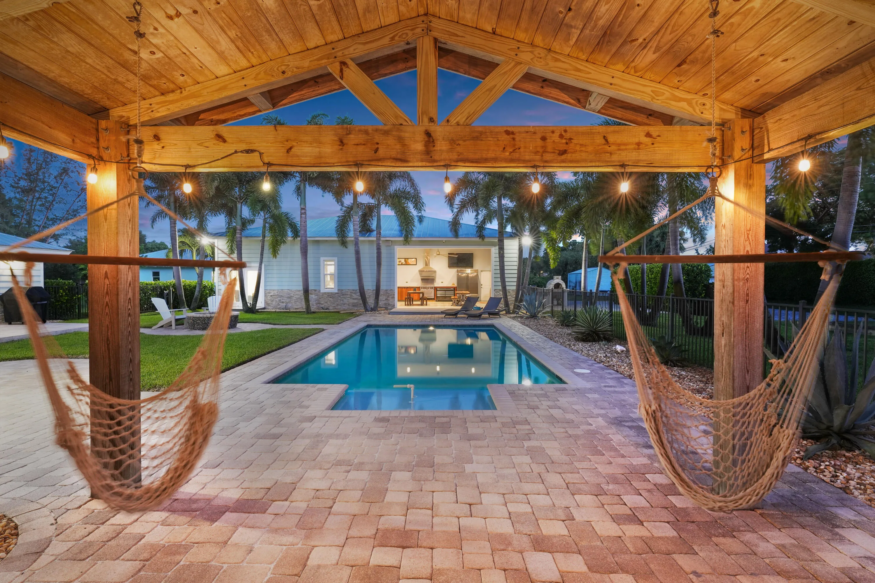 Hammocks hanging under Pool Shed