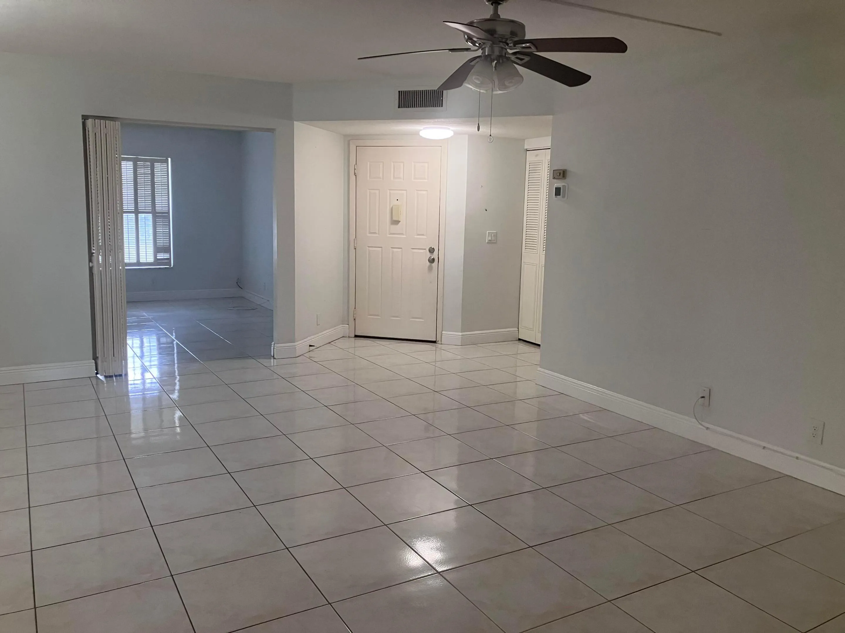 living room view to front door