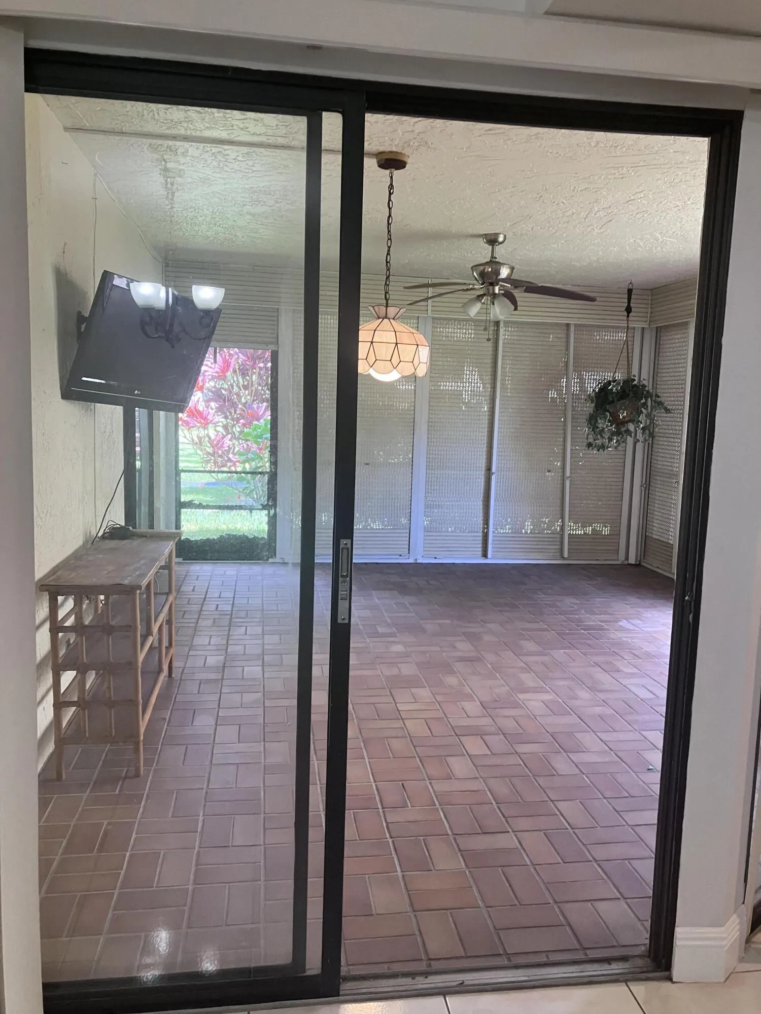 screened patio with hurricane shuters