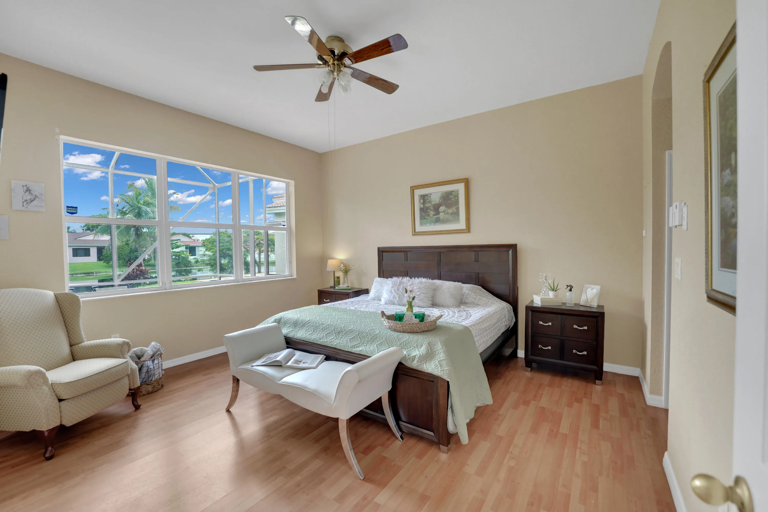 master bedroom with lake view and master bathroom