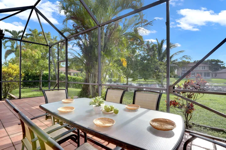 entertaining in this screened patio is a breeze